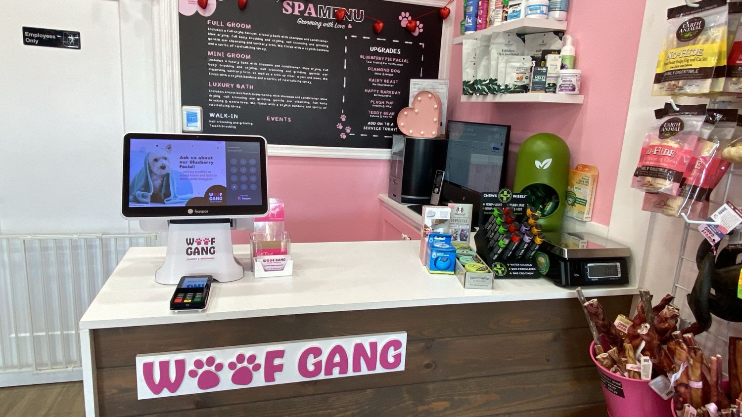 A Franpos point of sale at a pet grooming counter